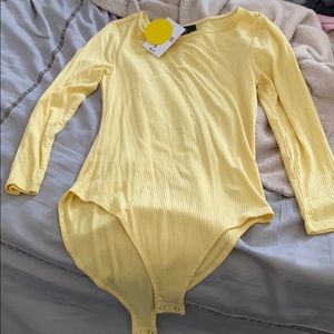 yellow bodysuit